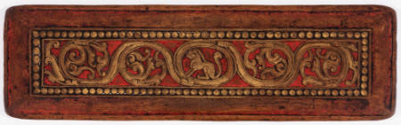 Book cover with lion and scrolling vine motif