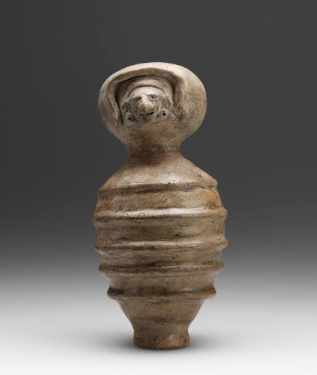 Ribbed Rattle Figure