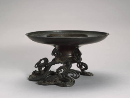 Flower dish (or lamp?) consisting of wide-rimmed bowl on a fitted stand with design of turtle among waves