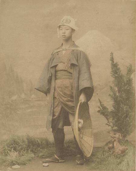 [Boy with large hat]