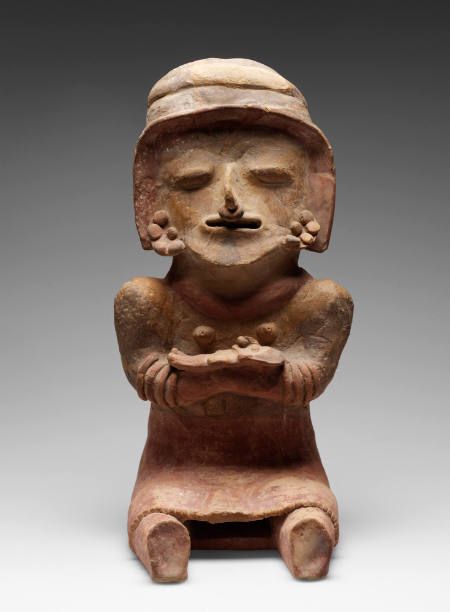 Seated female "gigante" figure with child
