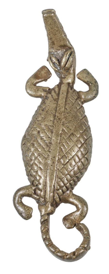 Goldweight in the form of a reptile with upturned snout, four curved feet, and curved tail