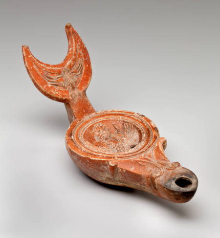 Oil lamp with crescent-shaped handle