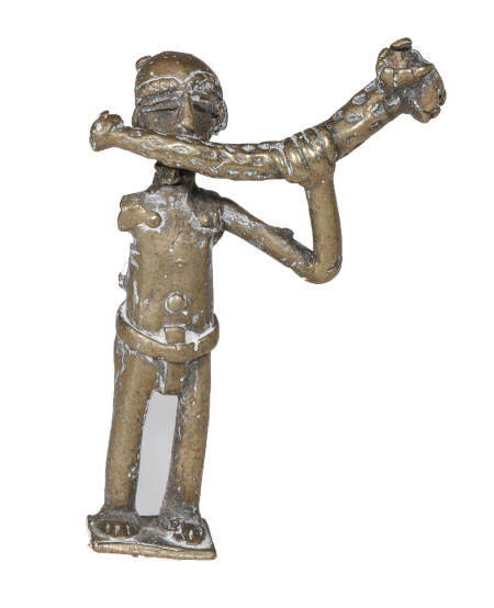 Goldweight in the form of a standing figure blowing a horn?