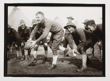 [Soldiers playing football]