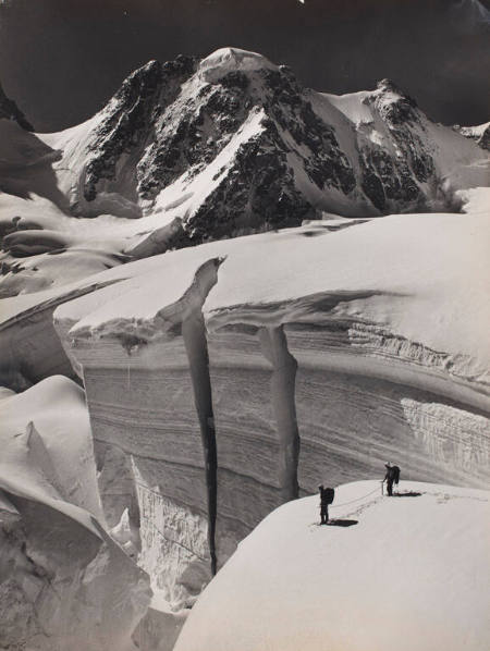 Alpinists on the Glacier des Periades with Mont Mallet in the background, Chamonix, France