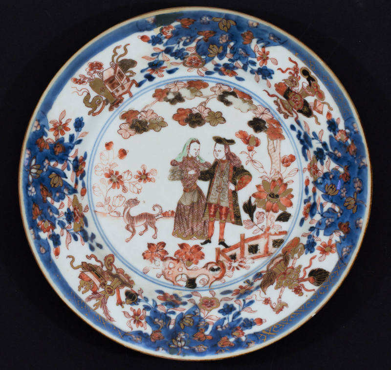 Plate with design of a Dutch couple in a garden