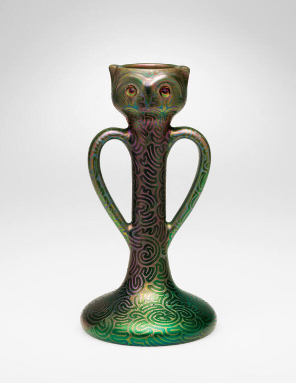 Candleholder with design of an owl's head