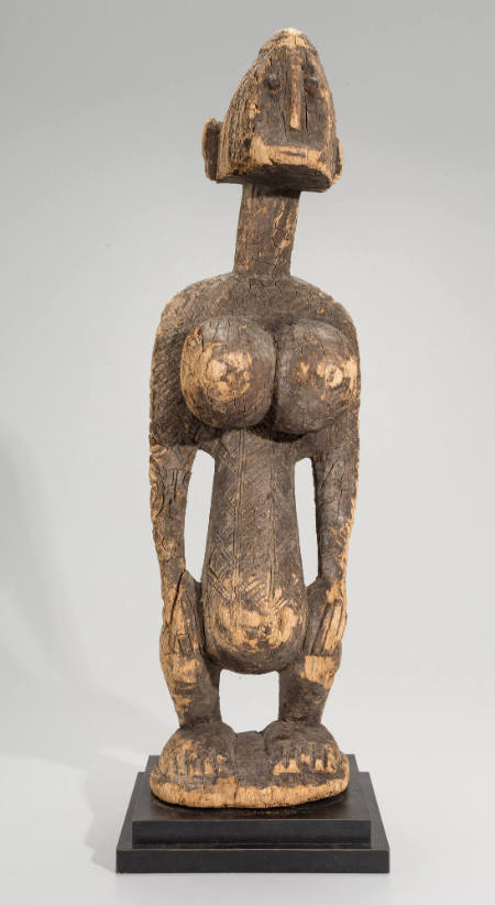 Female figure with a "keeled" head