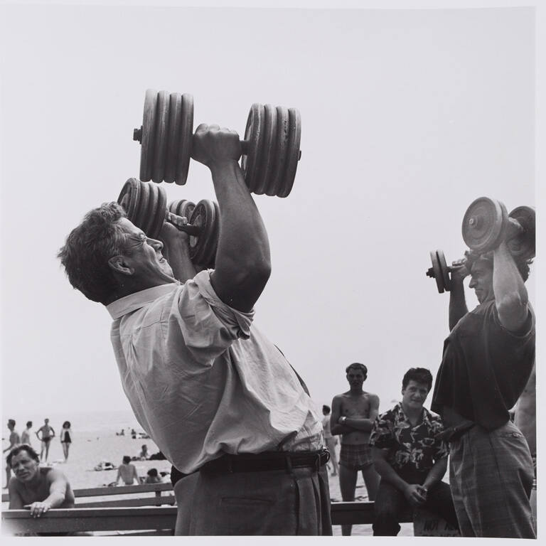 Man with dumbbells, Muscle Beach, California