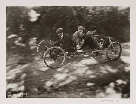 Zissou driving his "bob on 4 wheels" with Oleo and Louis as passengers, overloaded the bob is going to crash into a tree, from the portfolio J.H. Lartigue