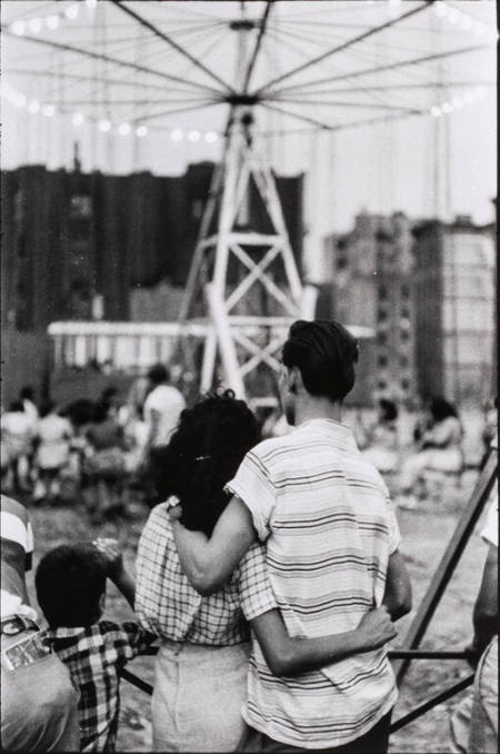 Street fair with back view of couple