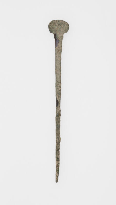 One of a group of various tools and pins