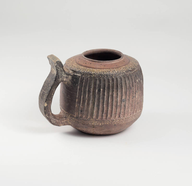 Cup with curved handle