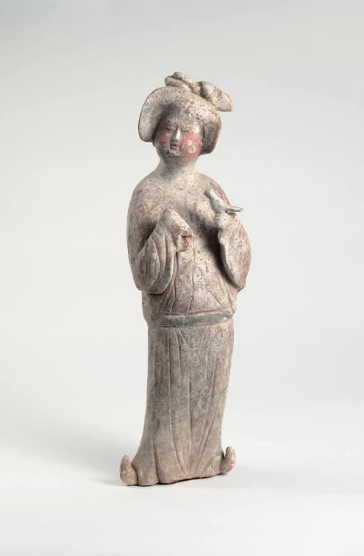 Tomb figure of a court lady holding a bird