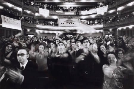 . . . hundreds of clapping supporters welcome their leader Blas Piñar to a meeting of the falangist group the Fuerza Nueva in a Bilbao cinema