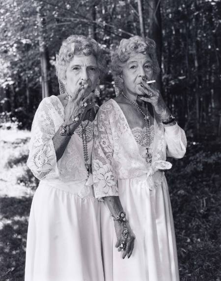 Two old women smoking, from the series Twins Festival