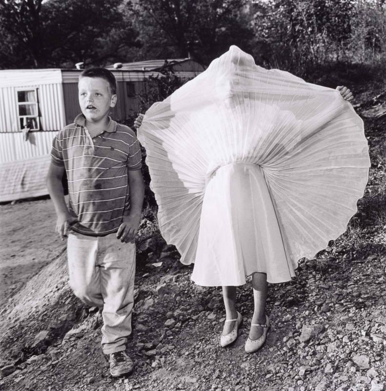 Boy and girl with dress lifted, from the series Rural Poverty