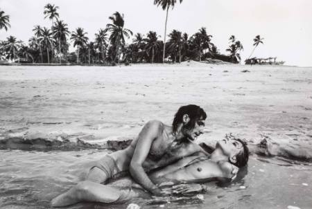 Couple embrace in ocean, from the series Indian runaways