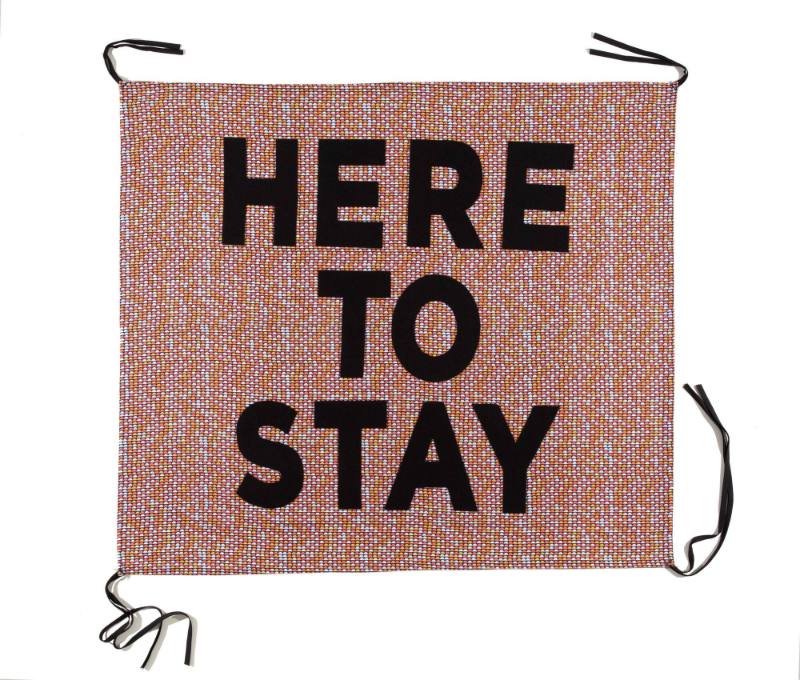 Here to Stay, from the artist's Protest Banner Lending Library (2016–ongoing), created by an anonymous workshop participant during the Johnson Museum exhibition, how the light gets in (September 7–December 8, 2019)