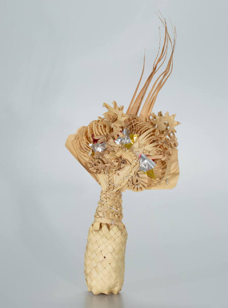 Cili figure with elaborate headdress