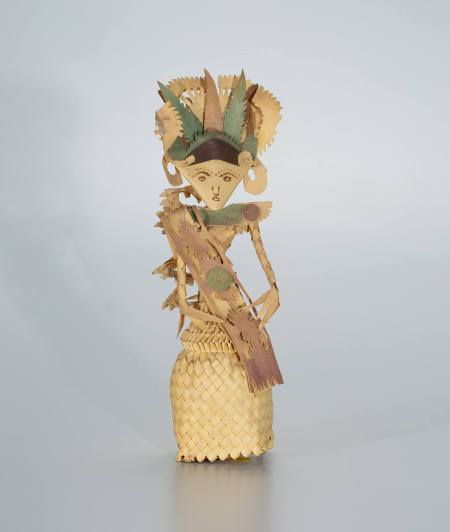 Cili figure with large headdress and red mouth