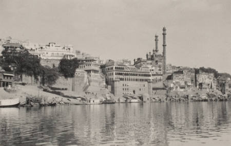 [View of city from river]