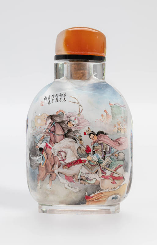 Snuff bottle with men riding into battle