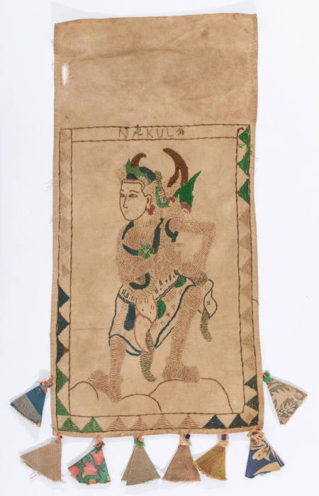 Offering cloth (lamak) with Nakula