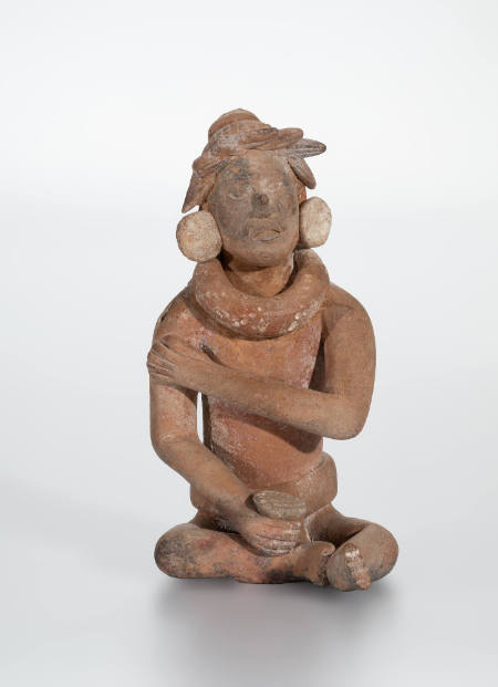 Seated male figure