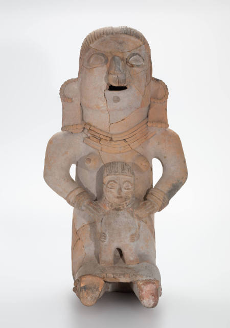 Seated female figure with child