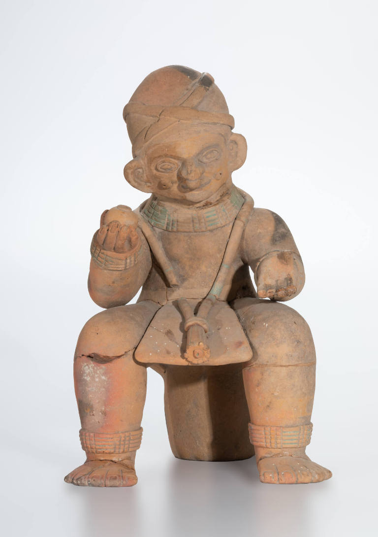 Seated male figure