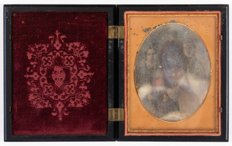 Untitled [Young child, husband holding baby]