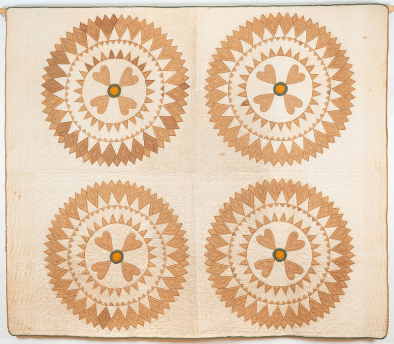 Quadrant quilt, variation of sunburst-type pattern