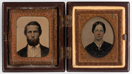 Untitled [Young couple: Bearded man, woman with hair pulled back, both with cheeks enhanced in red]