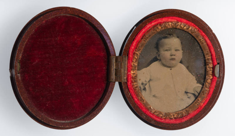 Untitled [Baby, cheeks enhanced in red]