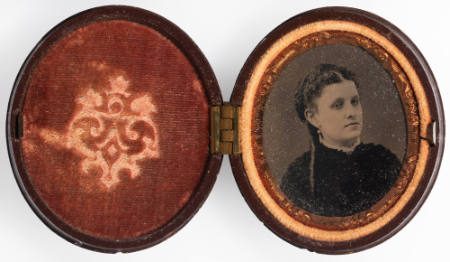 Untitled [Young woman, cheeks enhanced in red]