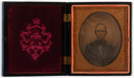 Untitled [Bearded man, cheeks enhanced in red]