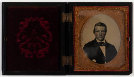 Untitled [Cleanshaven man with cheeks enhanced in red]