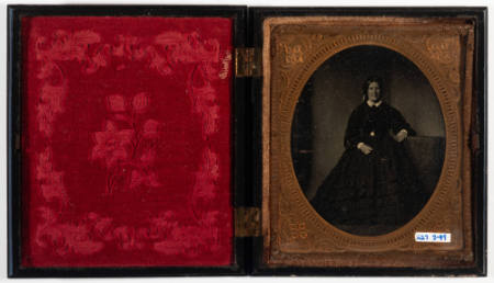 Untitled [Standing woman, smiling]