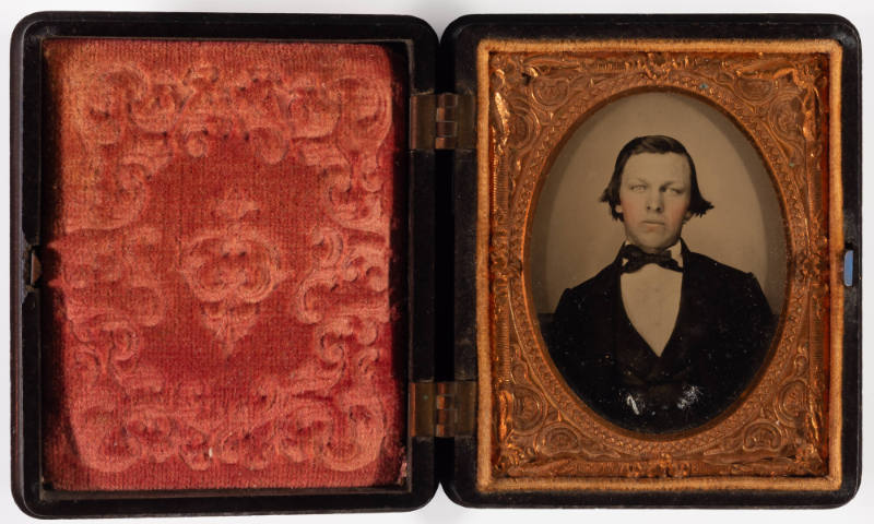 Untitled [Beardless young man, cheeks enhanced in red]