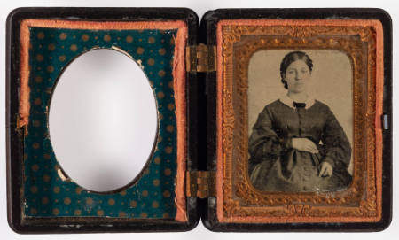 Untitled [Young woman, possibly pregnant, cheeks enhanced in red]