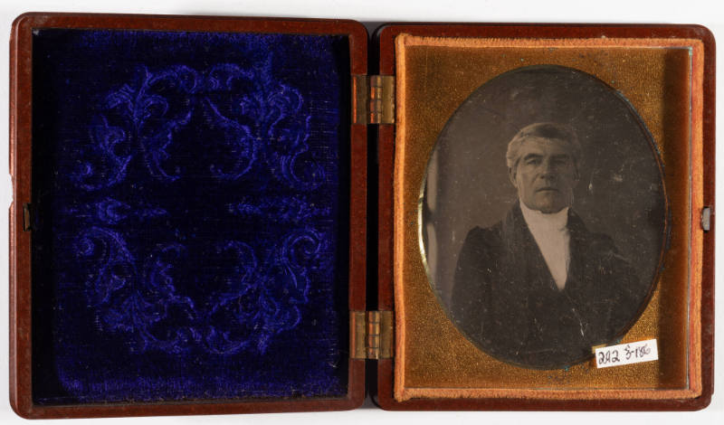 Untitled [Serious middle-aged man, cleanshaven]