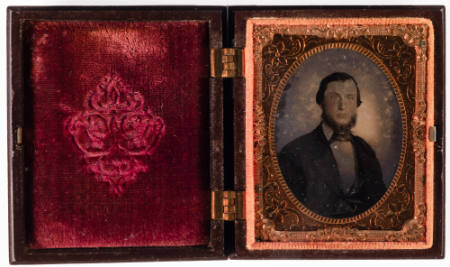 Untitled [Man with beard, cheeks enhanced in red]