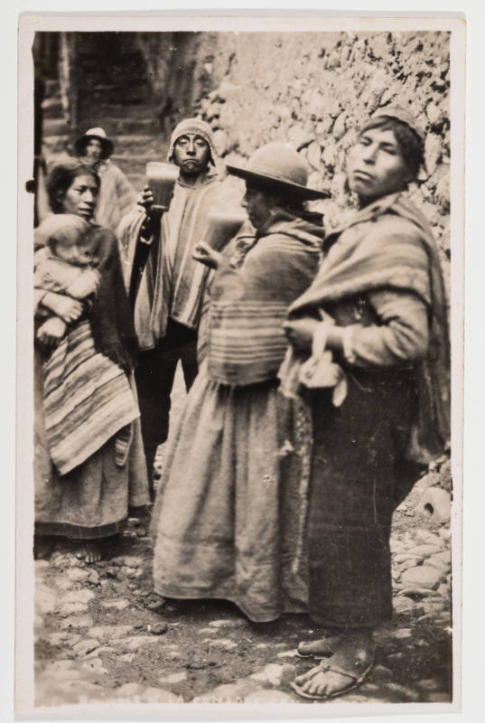 Untitled [Group of Andean peasants drinking corn beer in the Peruvian Highlands]
