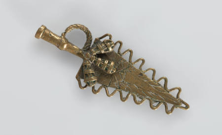 Goldweight in the form of a triangular implement with handle and scalloped edges