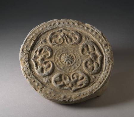 Fragment of a roof tile