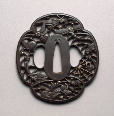 Openwork Tsuba with design of plant dwellers