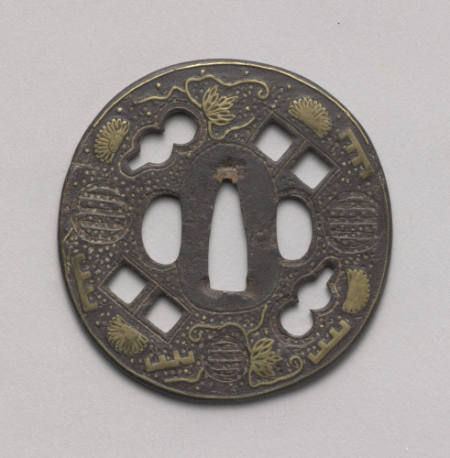 Tsuba with design of gourds, double squares, stylized mon and plants