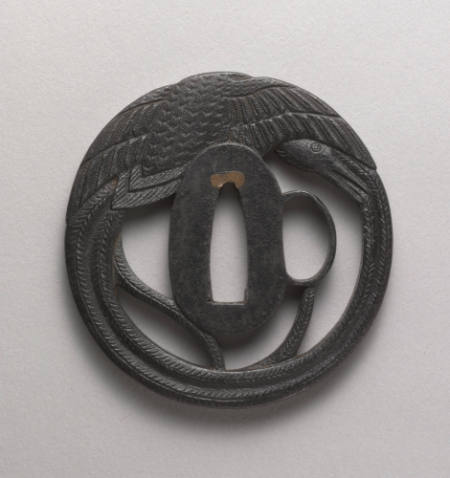 Openwork tsuba with bird of paradise